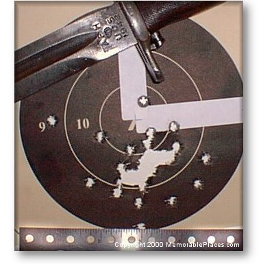 First target with match ammo at 100 yards shooter not trained for peep sights.