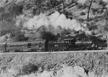 Short passenger train in the Canyon of the Merced River